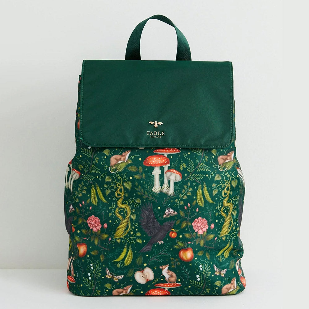 green woodland print backpack